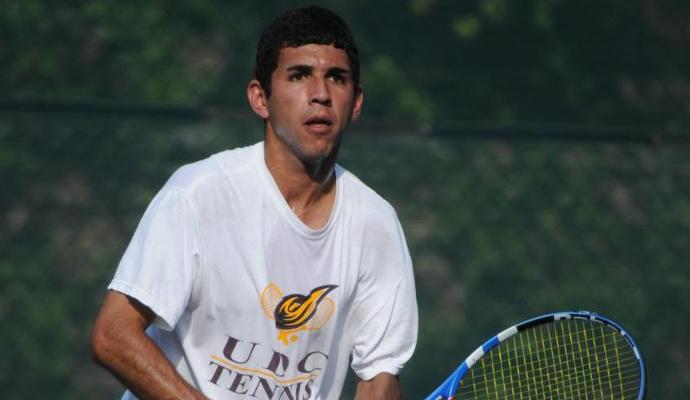 Senior Carlos Quiroga won both his singles and doubles match on Senior Day at UDC Tennis Courts.