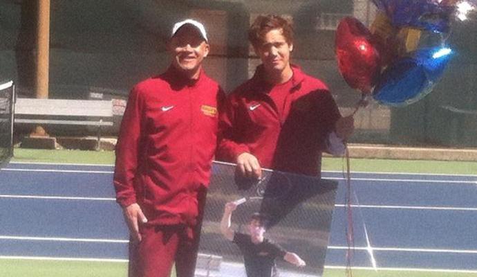 Fourth-year student-athlete Simon Andersson (at right) was honored before the match for Senior Day.