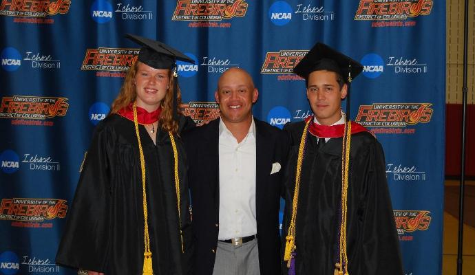 Maxime Duijst (left) and Simon Andersson (right) pose with head coach Dickie Mahaffey at this year's graduation reception.
