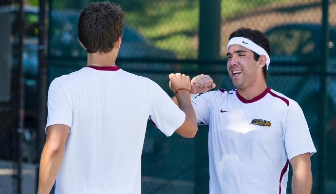 Diego Pinto (right) and doubles teammate Alexis Baguelin teamed up for an 8-4 win at No. 1 doubles.