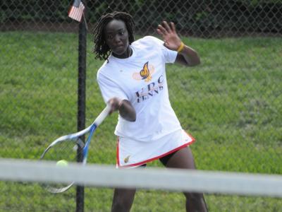 Ty Abilla won her first match of the spring season, 6-1, 6-0.