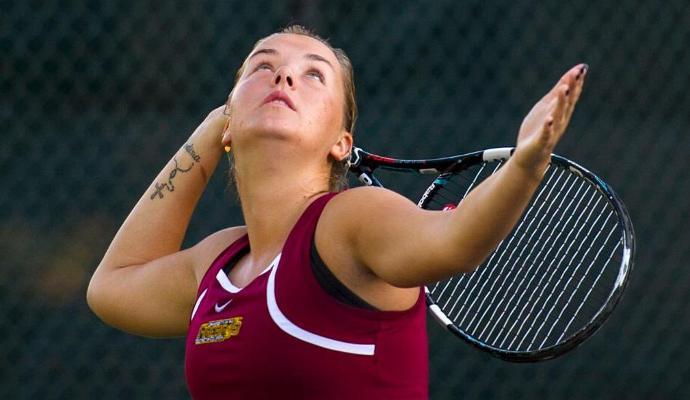Dominika Hadnadova earned victories at No. 1 singles and doubles.