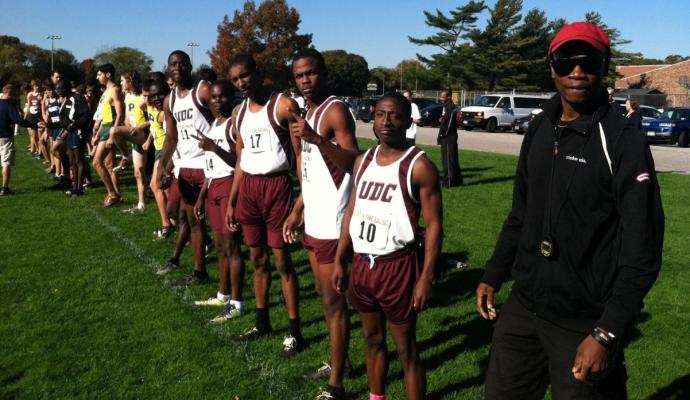 Head coach Alton McKenzie (far right) and three Firebirds men's runners will compete on Sunday at the NCAA East Regional in Nashua, N.H.